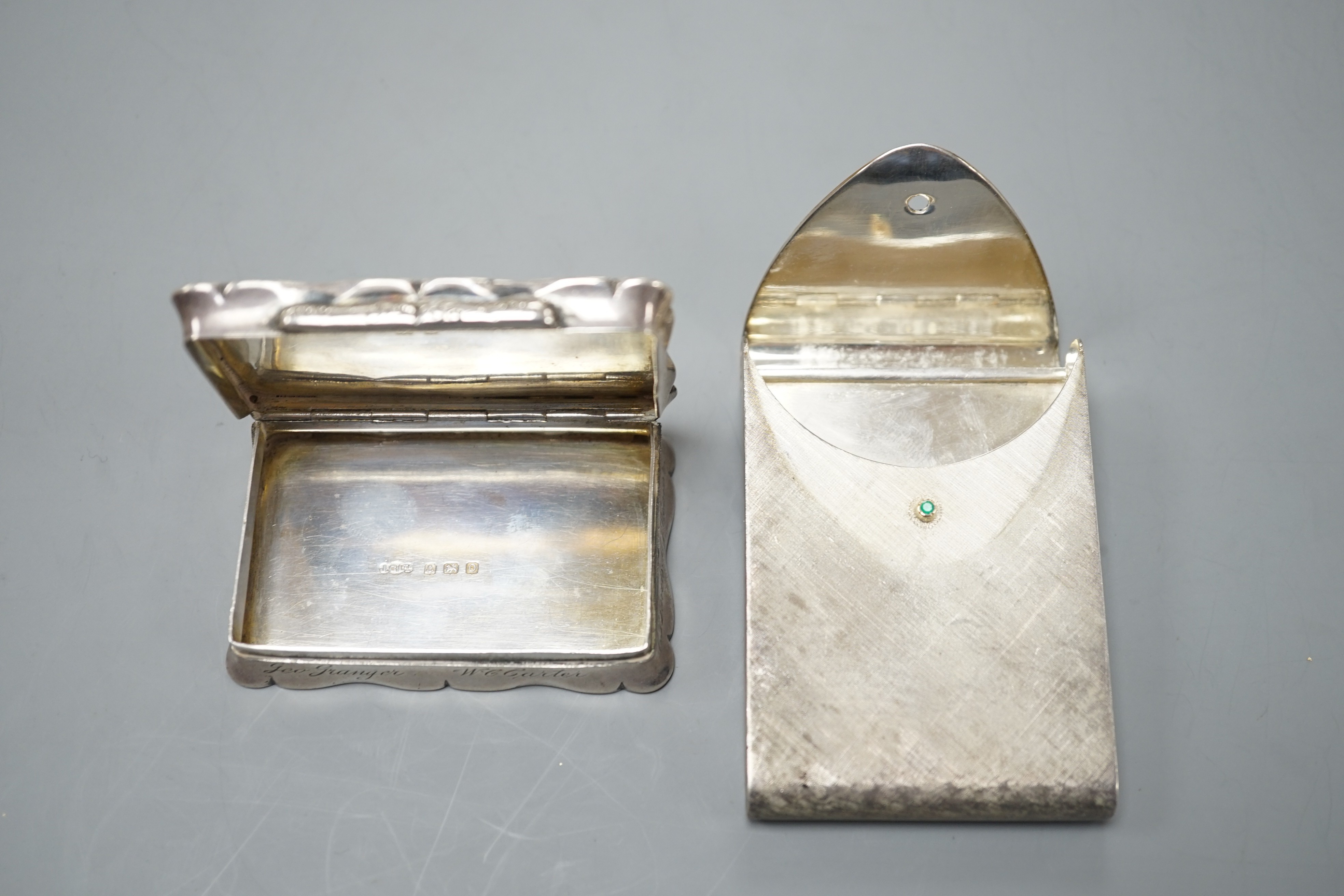 A George V engraved silver snuff box, Joseph Gloster Ltd, Birmingham, 1913, 71mm, with engraved inscription, together with and Italian brushed 925 and 750 cigarette case.
